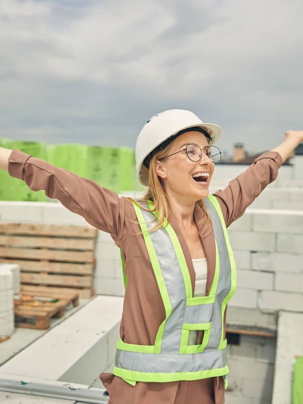 female-contractor-admiring-a-new-construction-object.jpg